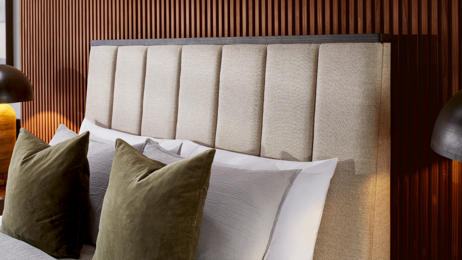 Lifestyle bedroom scene showing the Alexa King Upholstered Headboard