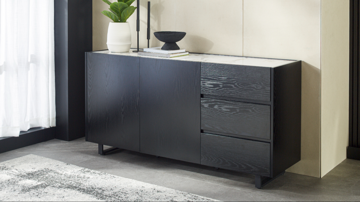 An angled view of the Andes 1600mm 2 Door 3 Drawer Buffet Table