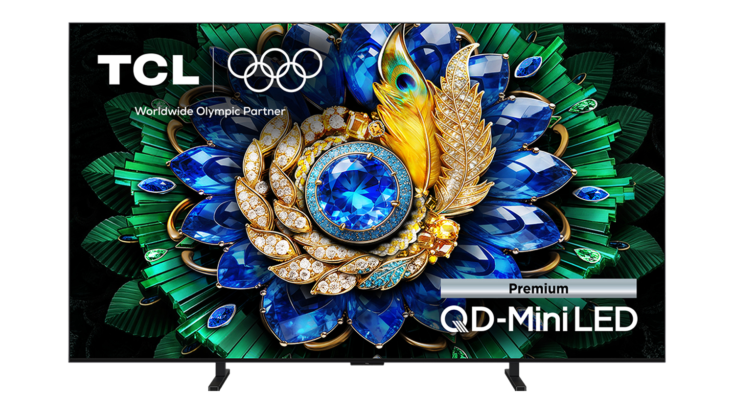 Front view of the TCL 75‑inch C6L TV on dual feet, displaying a detailed blue and green jewelled floral image