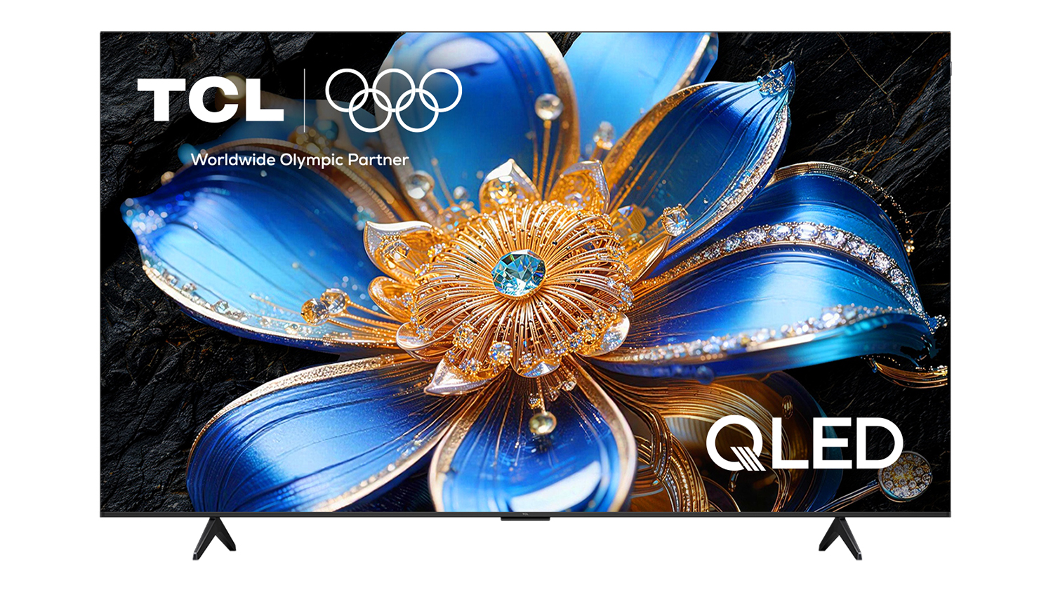 Front view of the TCL 85-inch P7LS QLED TV on dual feet, showing a vivid blue and gold floral image on screen