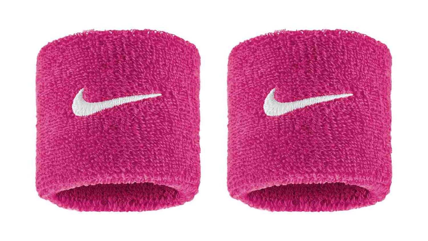 A pair of pink Nike wristbands with white Swoosh logo