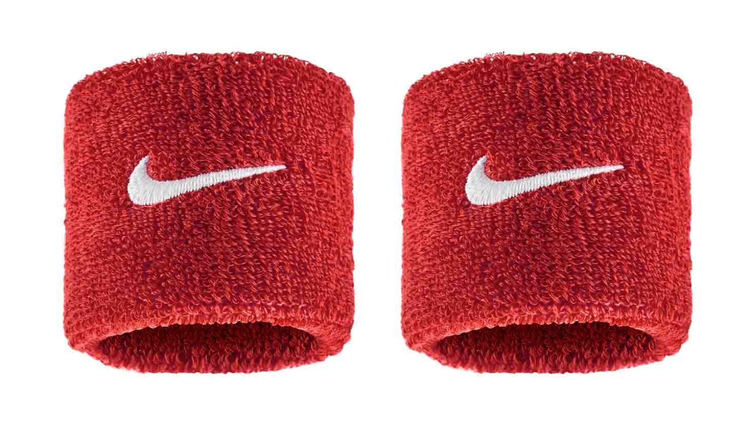 A pair of red Nike wristbands with white Swoosh logo