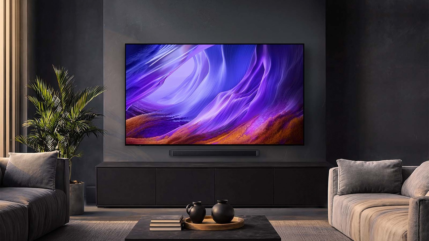 Front view of the Samsung OLED television showing ultra‑thin frame, vibrant OLED colours, and wide screen display