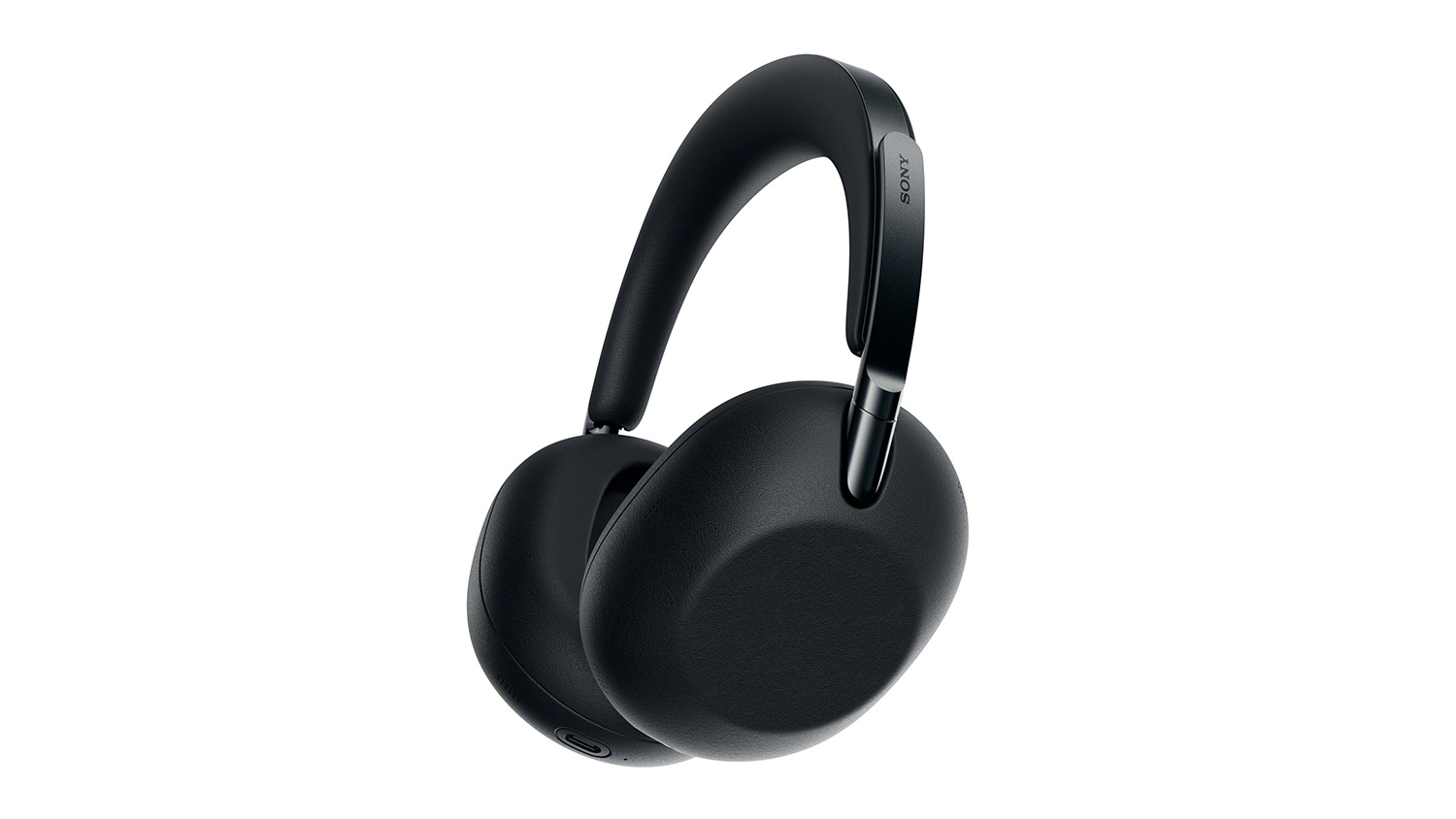 Angled side view of the Sony WH‑1000X black over‑ear headphones showing plush earcup and Sony logo