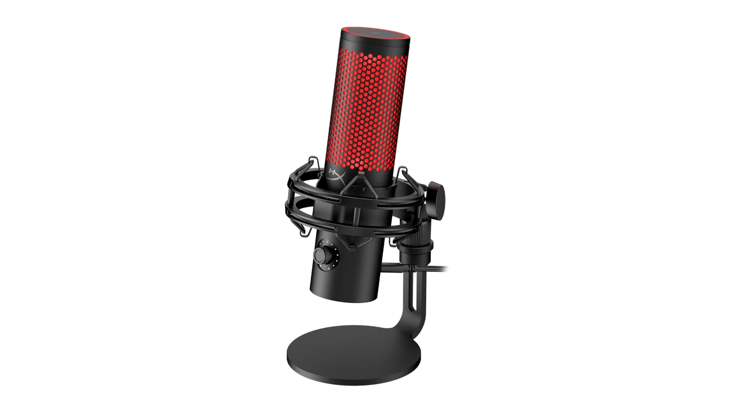 Angled view of a black HyperX QuadCast 2 USB gaming microphone with a red honeycomb grille, mounted on a shock mount and desk stand