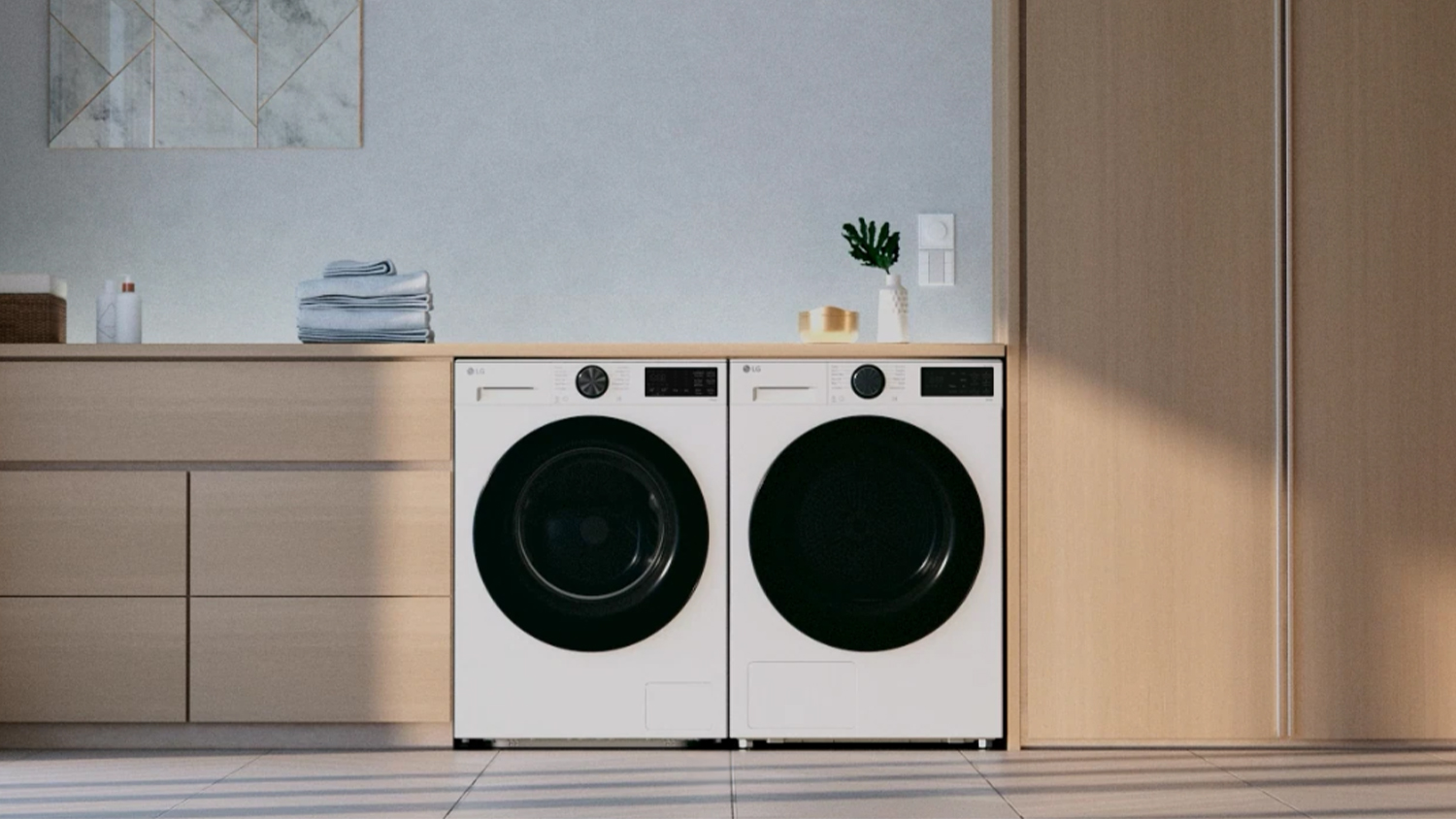 LG front-load machines in a modern minimalist studio setting