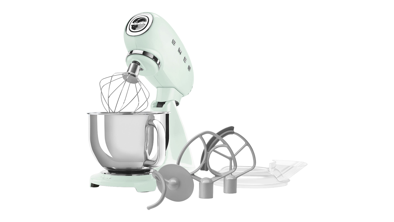 Glossy pastel green Smeg 50’s Style stand mixer shown, revealing a wire whisk with included attachments