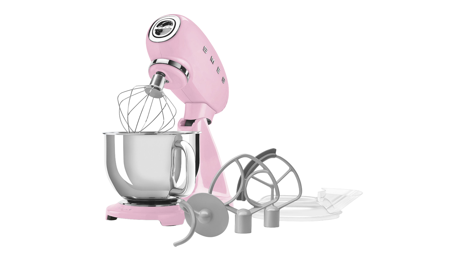 Glossy pink Smeg 50’s Style stand mixer shown, revealing a wire whisk with included attachments