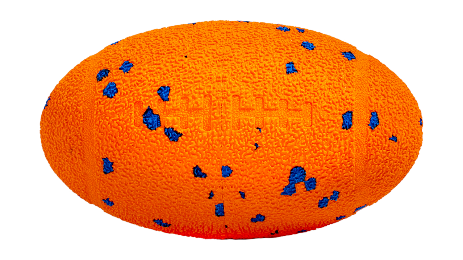 Close-up of a textured orange Cheerble Wicked Rugby smart pet toy for dogs with blue speckles and faint stitching