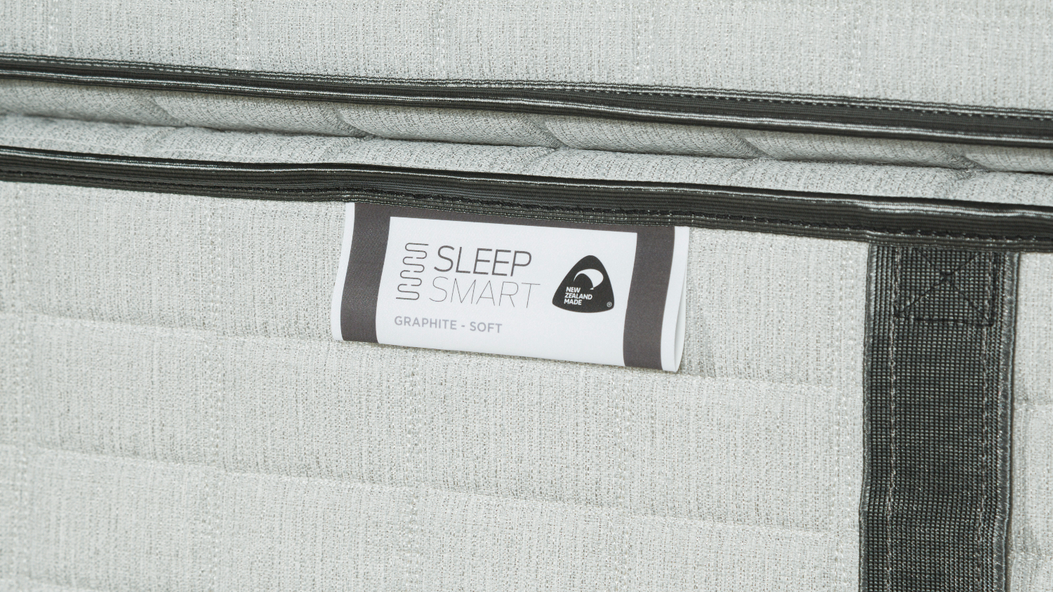 A label on a Sleep Smart Mattress identifying the model and indicating it is a "Soft" comfort level