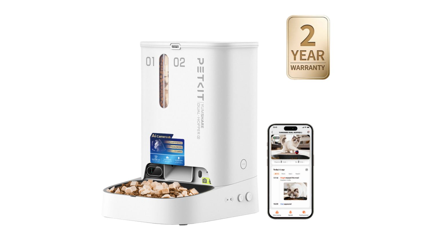 A white PETKIT dual hopper automatic pet feeder next to a smartphone showing a cat video app screen
