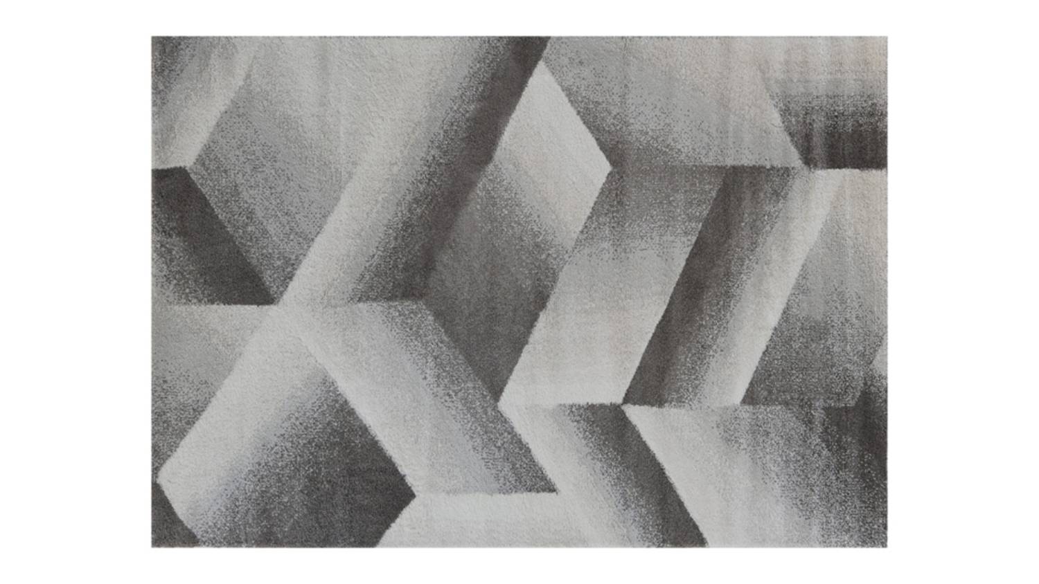 Full view of a charcoal rug showing slightly ribbed texture with faint linear pattern