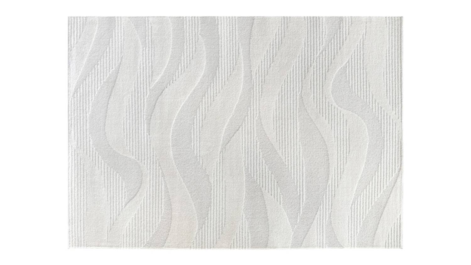 Full view of white rug surface with flowing wave-like texture and soft neutral finish