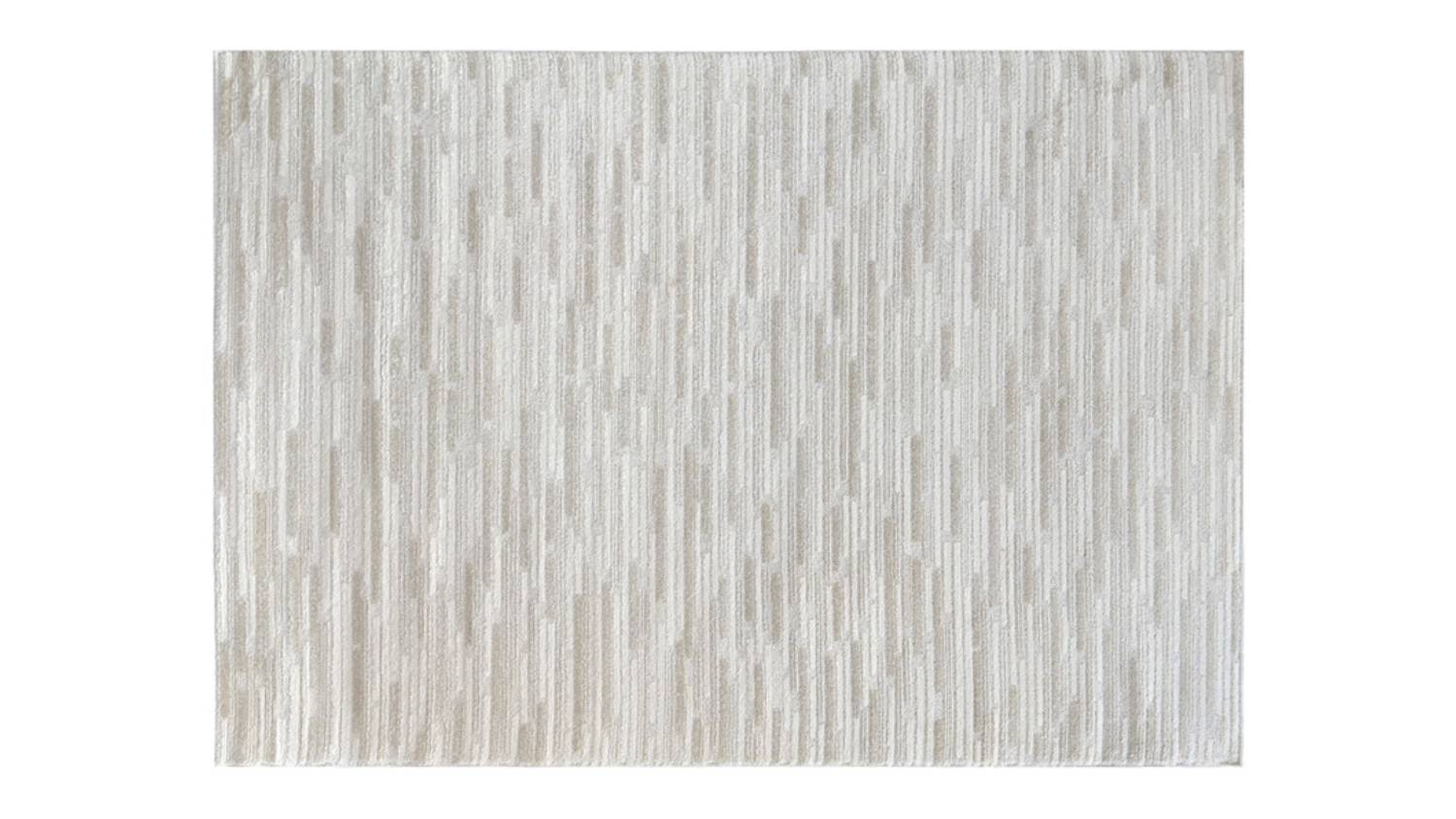 Georgie Texture Rug featuring a subtle linear pattern with soft tonal variations in ivory, beige and light grey