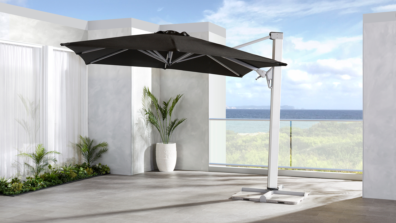 Centaurus 3.0m square cantilever outdoor umbrella with a black canvas canopy fully open