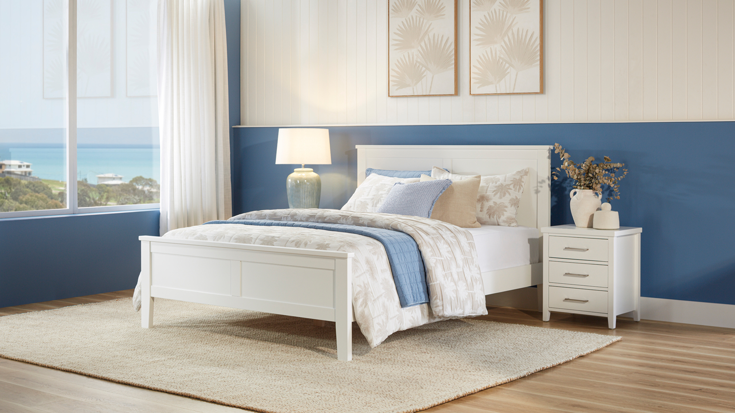 Front view of white bed set featuring the Alphine King Bed Frame