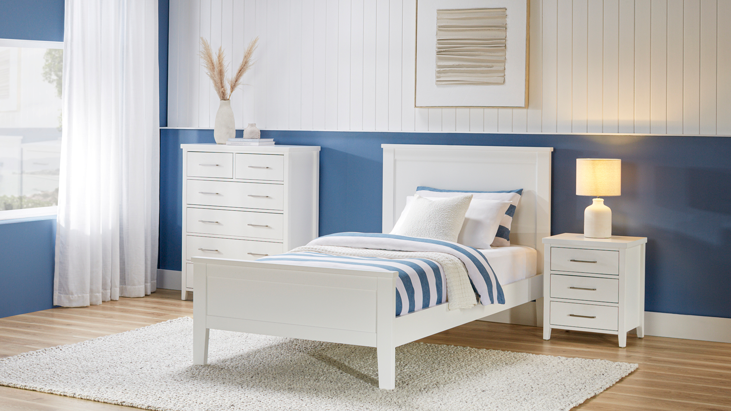 Front view of white bed set featuring the Alphine King Single Bed Frame
