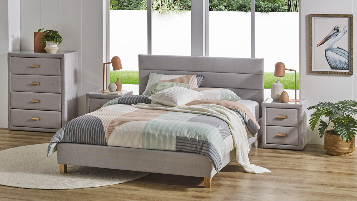 Benz Queen Upholstered Bed Frame in light grey fabric, styled in a contemporary bedroom
