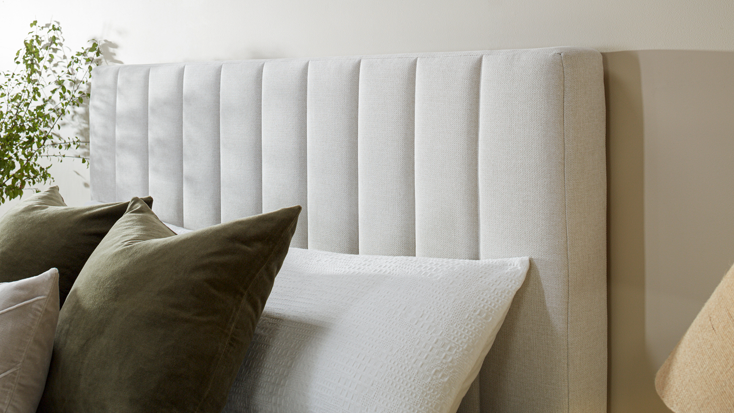 Close-up view of the Majestic Home Kyoto Queen Upholstered Headboard by Mlily in a modern bedroom