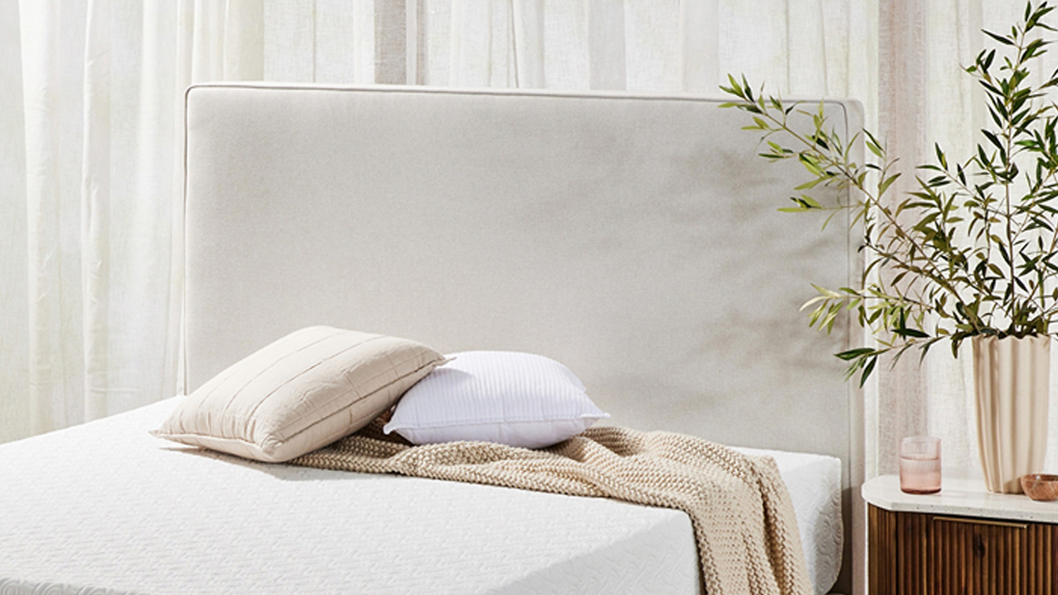 Close-up view of the Majestic Home Oslo Queen Upholstered Headboard by Mlily in a modern bedroom
