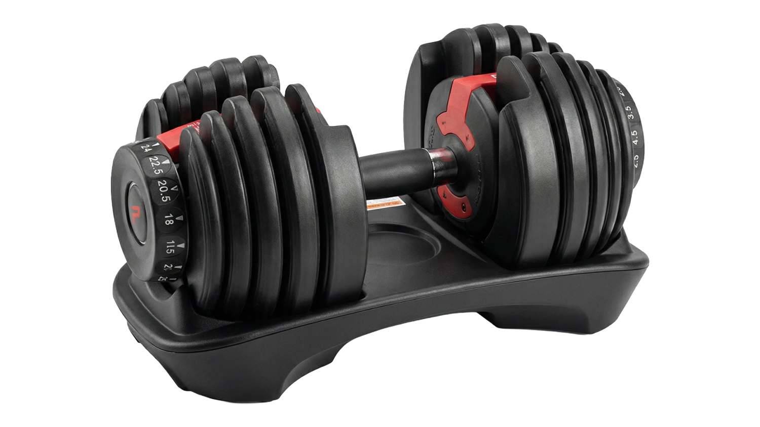 PROTRAIN adjustable dumbbell with selectable weight plates resting on a black storage tray