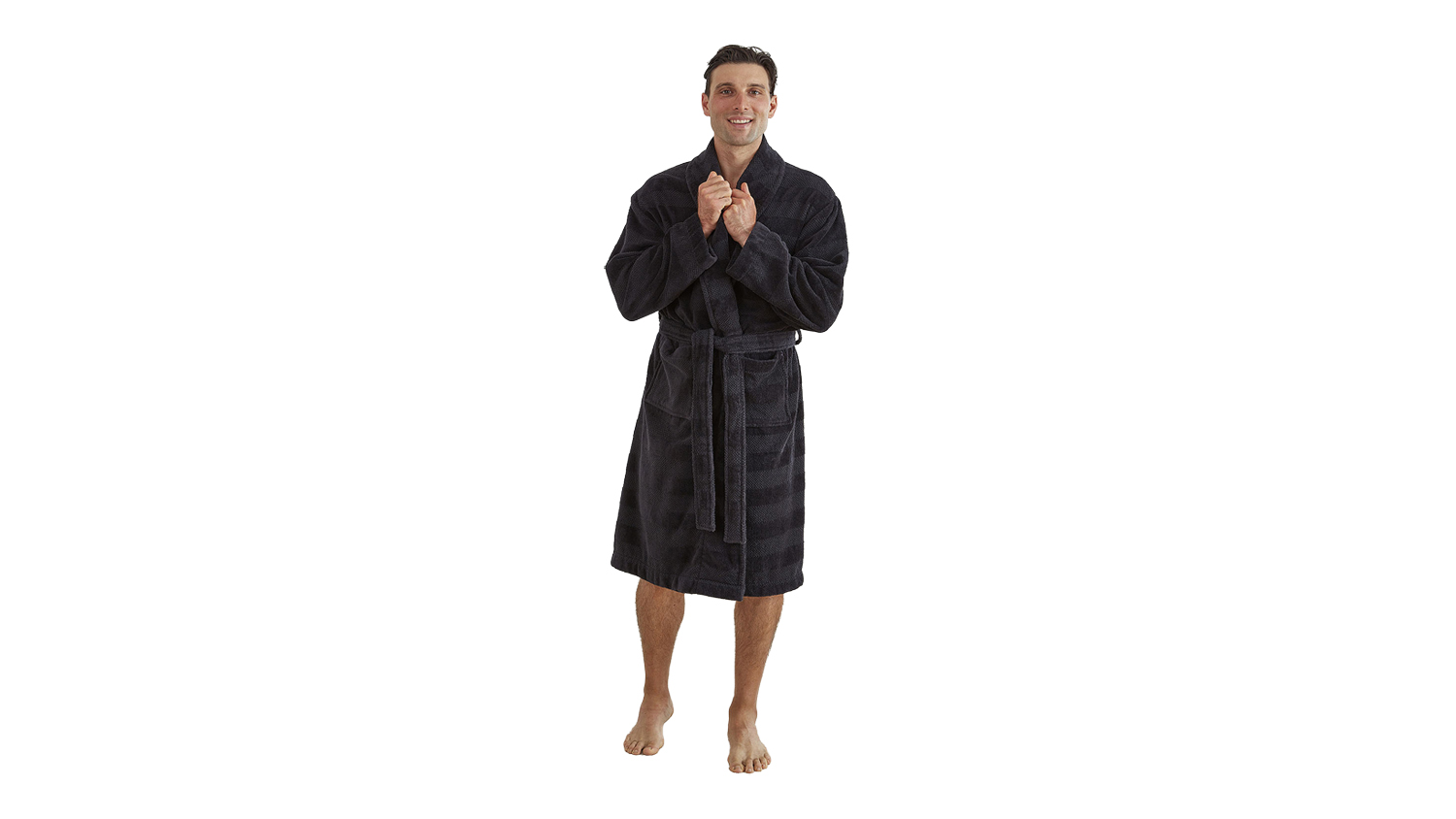 Person standing barefoot in a dark plaid Baksana Aiden Bath Robe, holding the collar