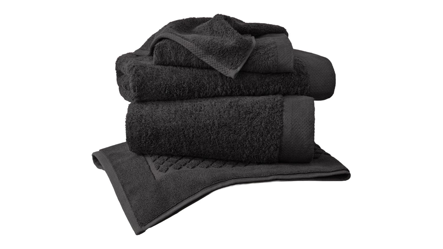 Stack of soft black Baksana Bamboo Fabric Towel Set and a matching bath mat, neatly folded