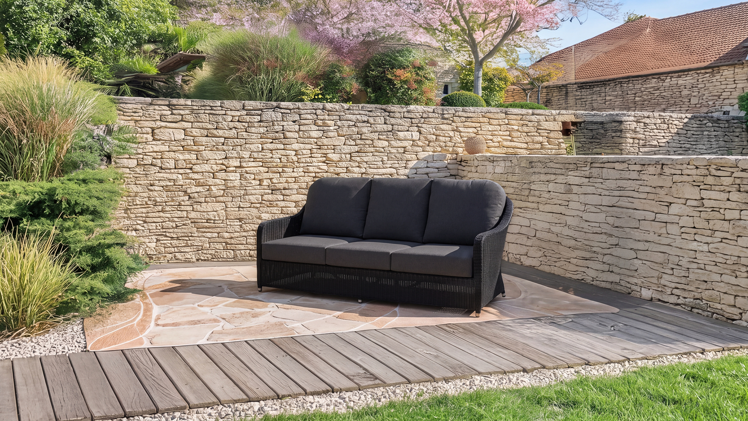Marbella 3 Seater Outdoor Sofa featuring a woven wicker-style frame with three dark grey seat and back cushions