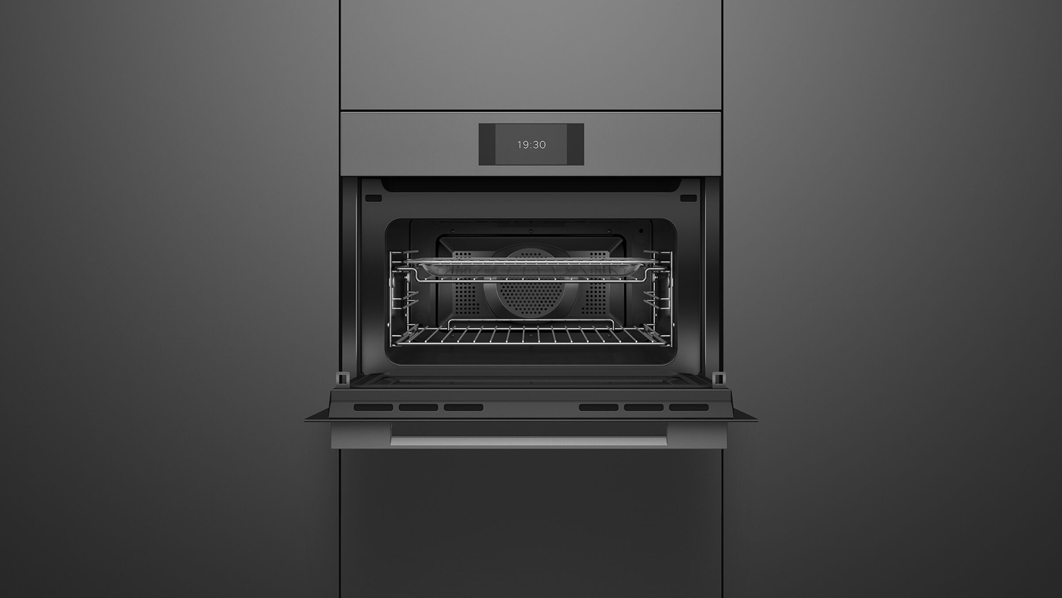 A view of the unit integrated into a sleek grey wall with its door opened