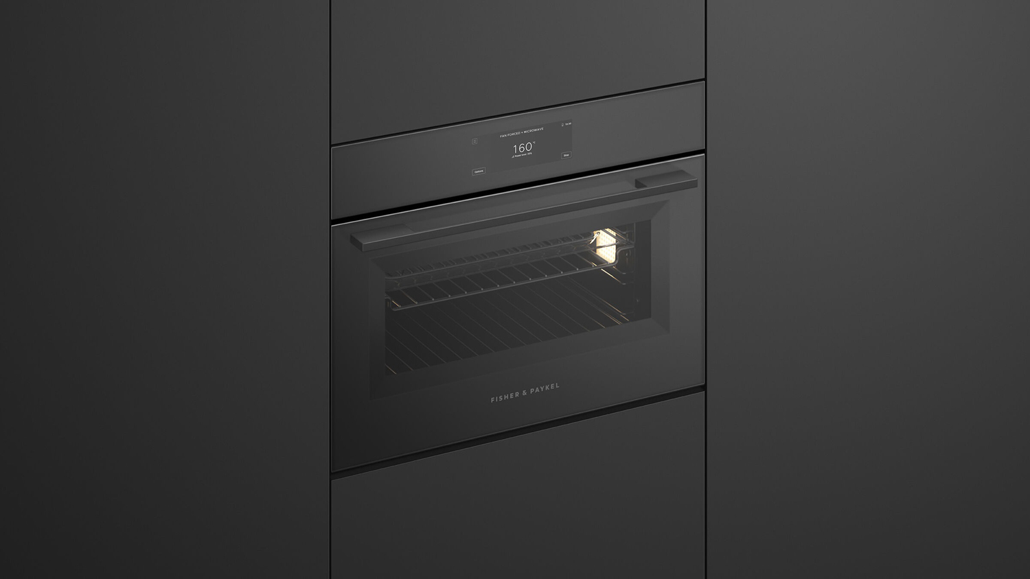 A view of the unit integrated into a sleek black wall