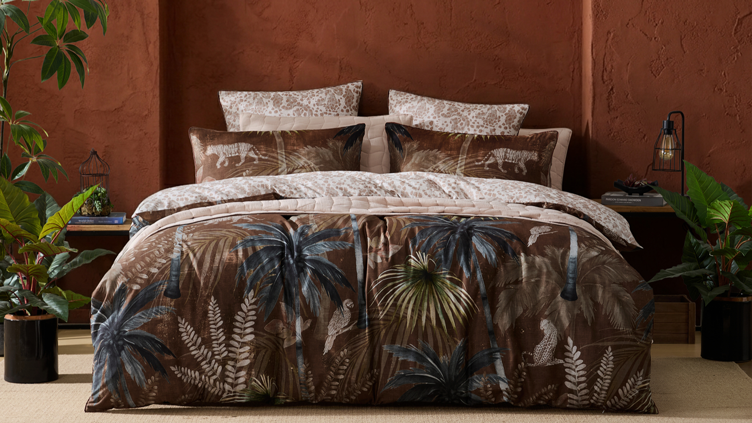 Brown tropical jungle print duvet cover set with palm leaves, wildlife motifs and neutral patterned reverse