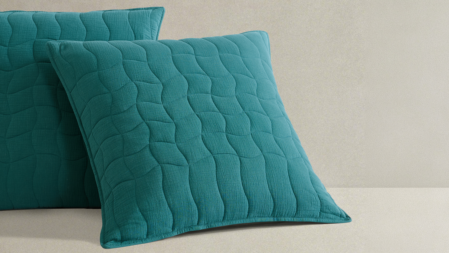 Teal Halcyon Lagoon European pillowcase featuring wavy quilted fabric texture