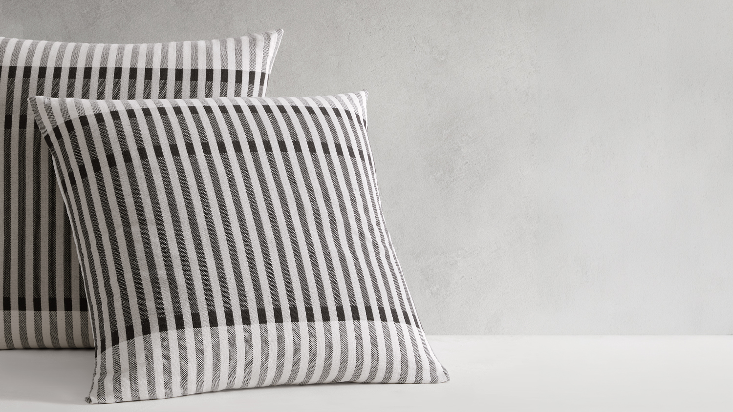 Maddox Stone European pillowcases with black and white vertical stripe pattern