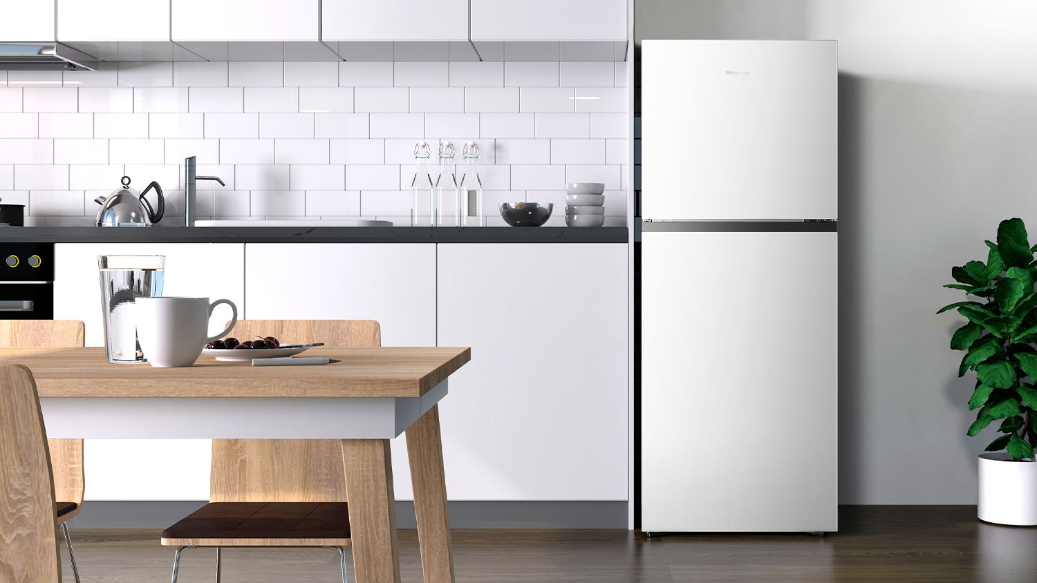 A view of the fridge freezer right bedside a clean white modern kitchen