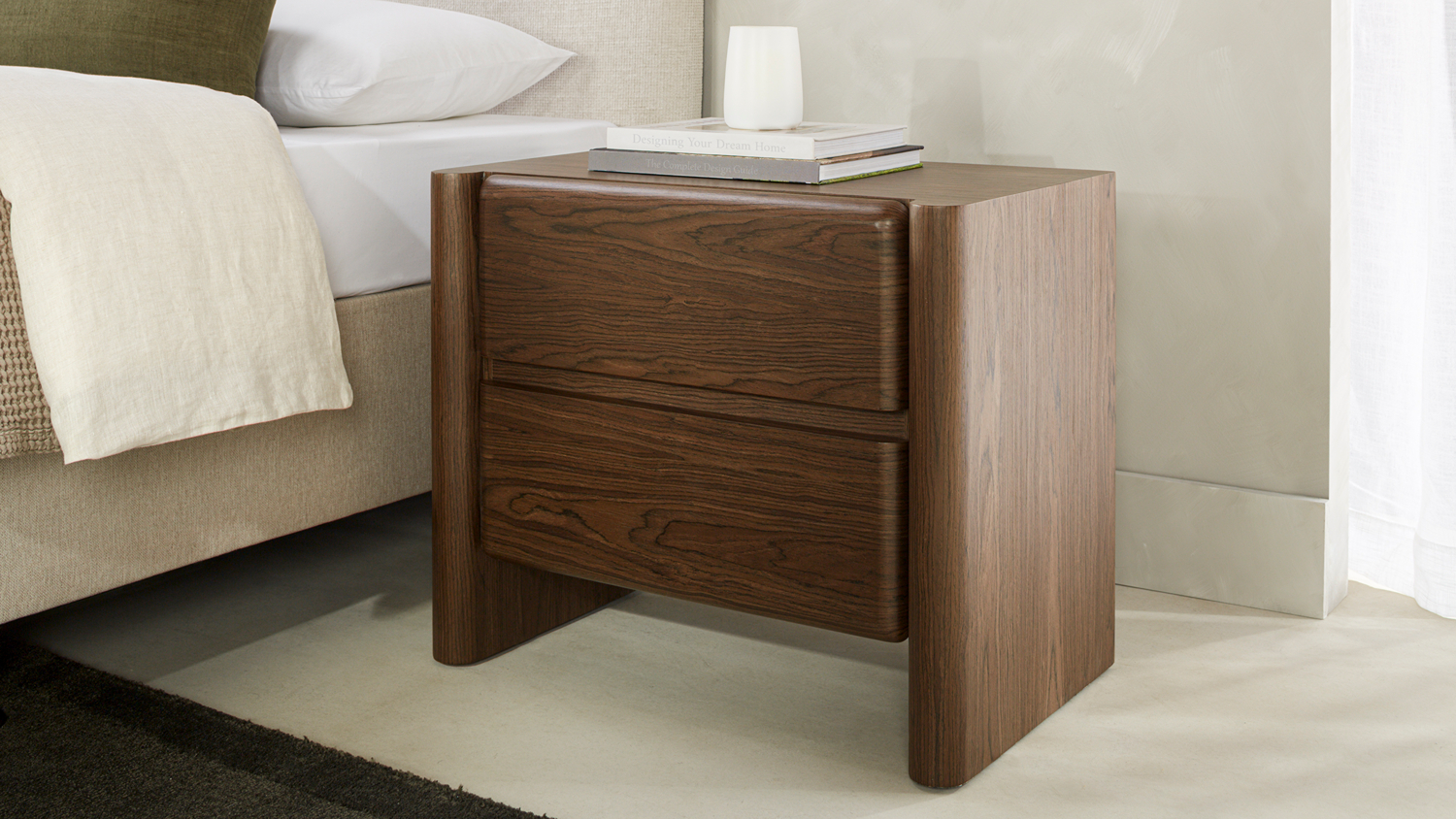 Gia 2 Drawer Bedside Table in a dark walnut finish, featuring a curved-frame design with rounded edges
