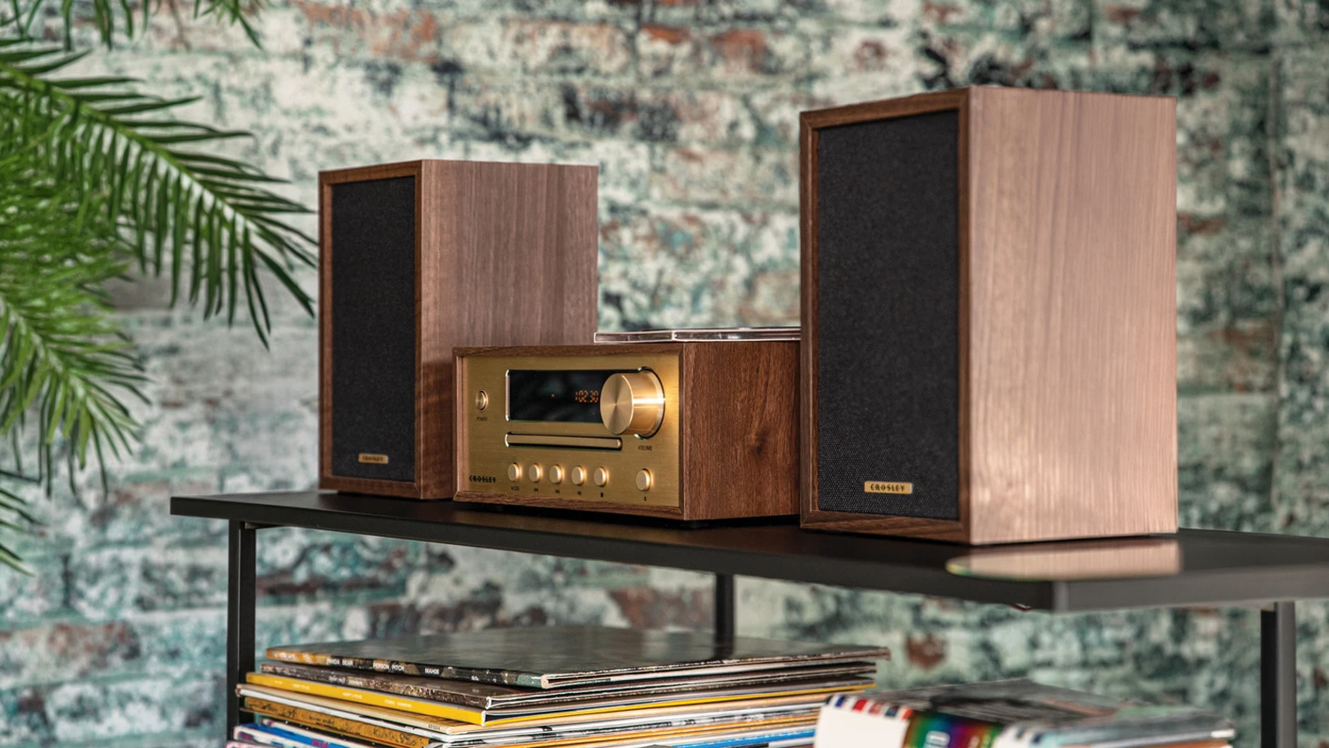 Walnut-effect hi-fi system with matching bookshelf speakers on a shelf