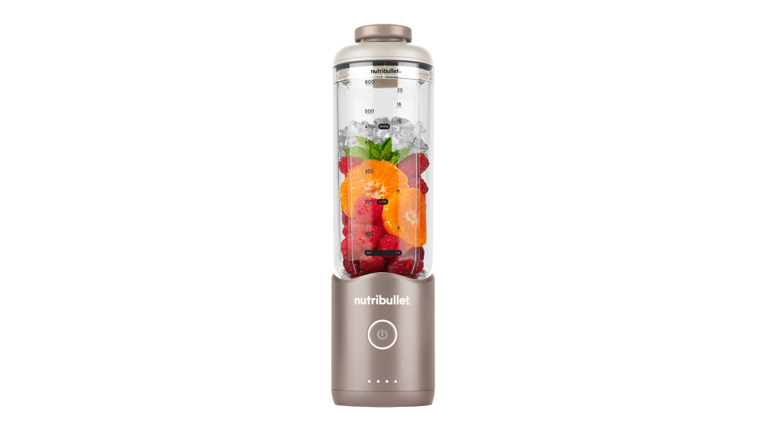 Nutribullet Flex Portable Blender in Dune Beige, filled with sliced oranges, raspberries, and ice