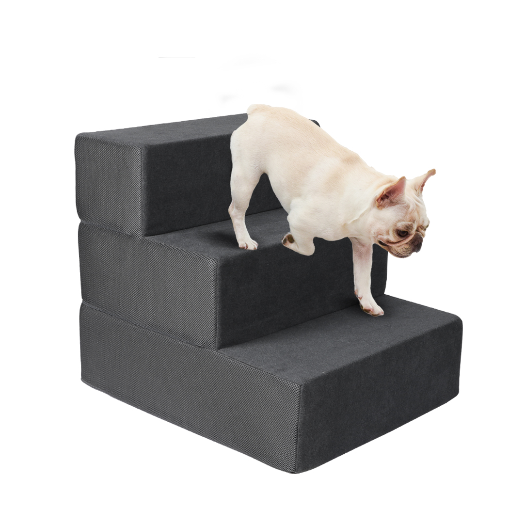 Dark grey PaWz Foam Pet Stairs featuring a dog climbing down the steps