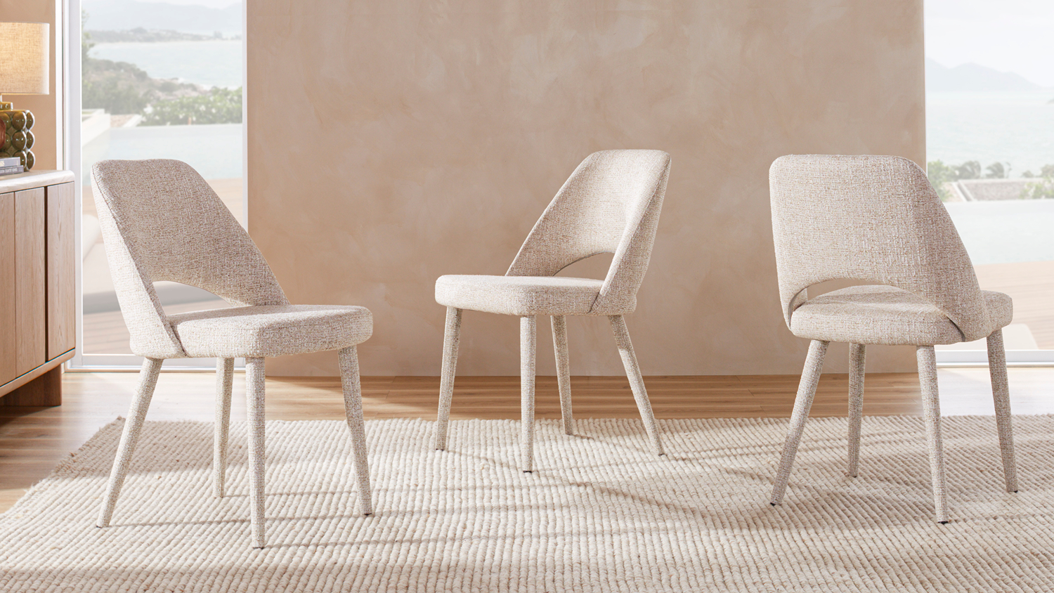 Oxford Fabric Dining Chair in beige upholstery, shown from a front angled view