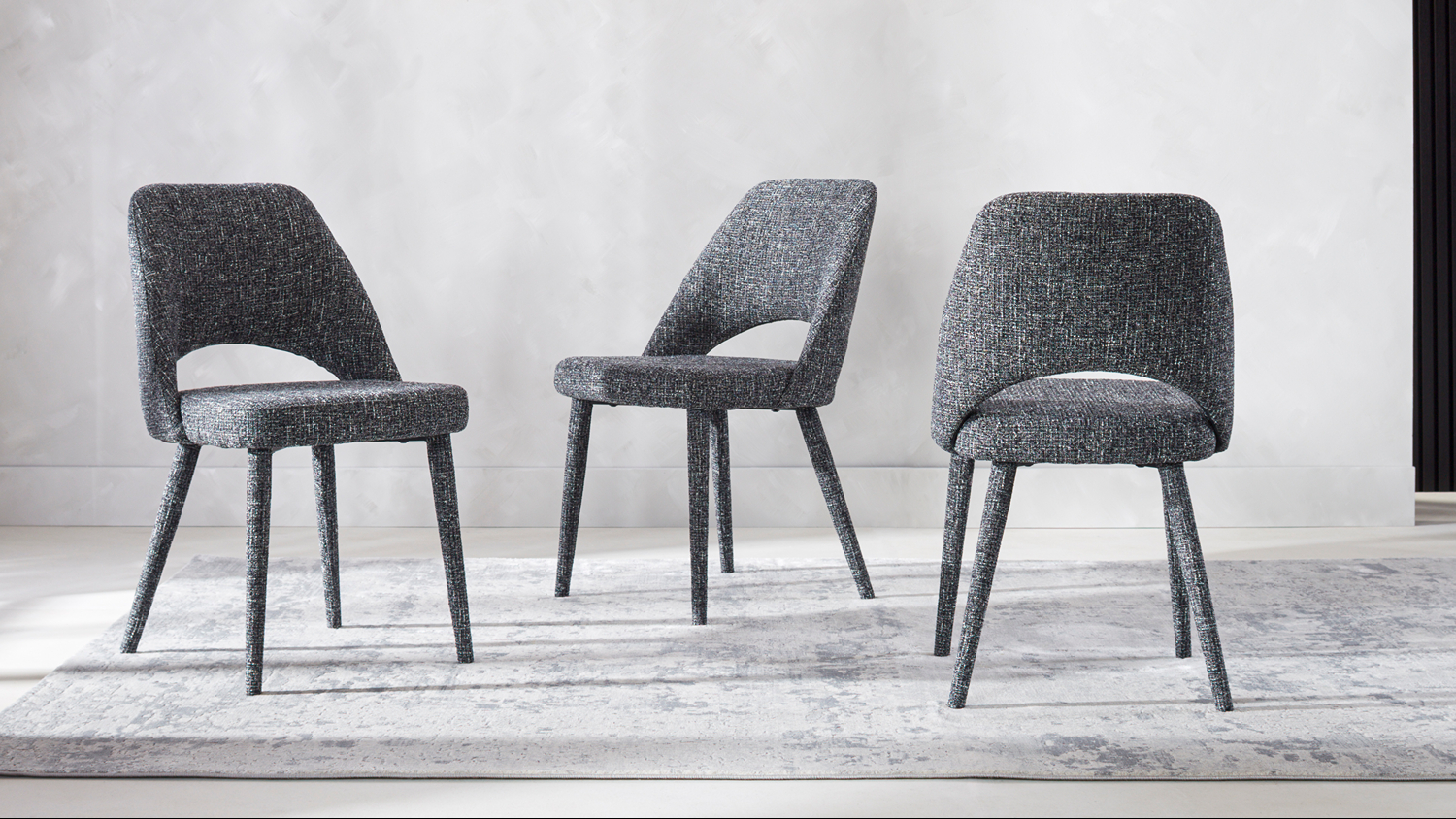 Front view of the Oxford Fabric Dining Chair in graphite upholstery, featuring a padded seat