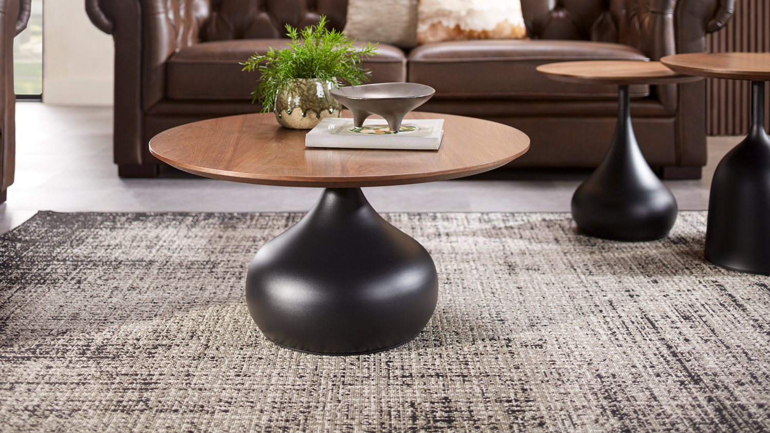 Lifestyle view of the A view of the Comus Coffee Table Collection