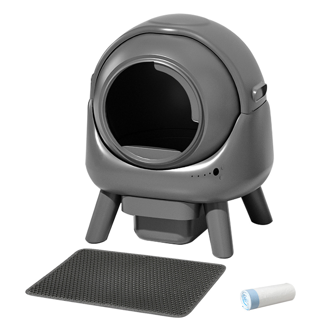 Grey PaWz Automatic Cat Litter Box with legs, a textured litter mat, and a roll of waste bags