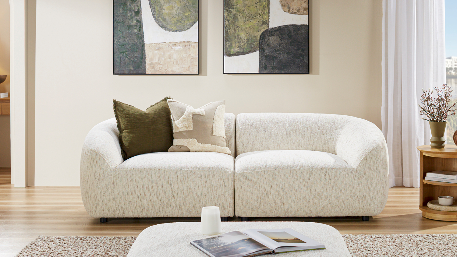 Villa 2-seater fabric modular sofa styled with decorative throw pillows in a modern living room