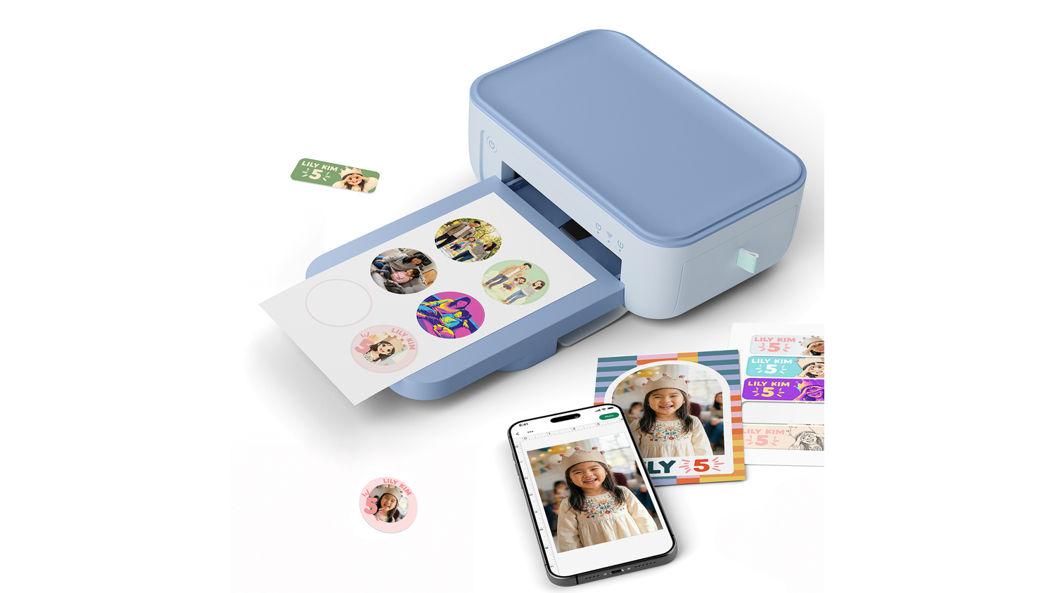Top view of the blue Cricut Scout Machine printing photos and stickers from a smartphone