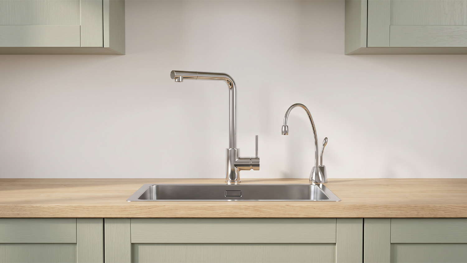 Front view of the InSinkErator ChillTap Chilled Filtered Side Tap mounted over a stainless steel kitchen sink
