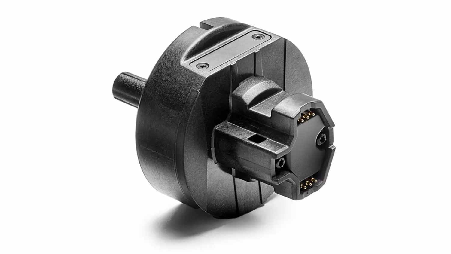 Close-up view of a Thrustmaster Driving Wheel Quick Release Upgrade Adapter showing the black electronic connector base and mounting mechanism