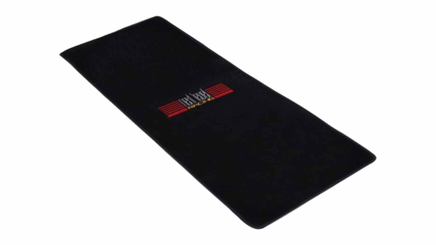 An angled view of a black Next Level Racing floor mat with a centred logo and a rectangular non-slip design