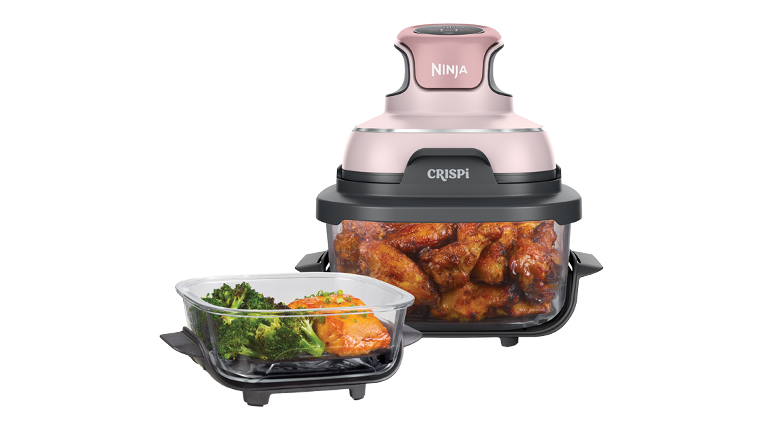Front view of a pink and black Ninja Crispi 4-in-1 Portable Glass 3.8L Air Fryer containing chicken wings next to a glass dish of salmon and broccoli