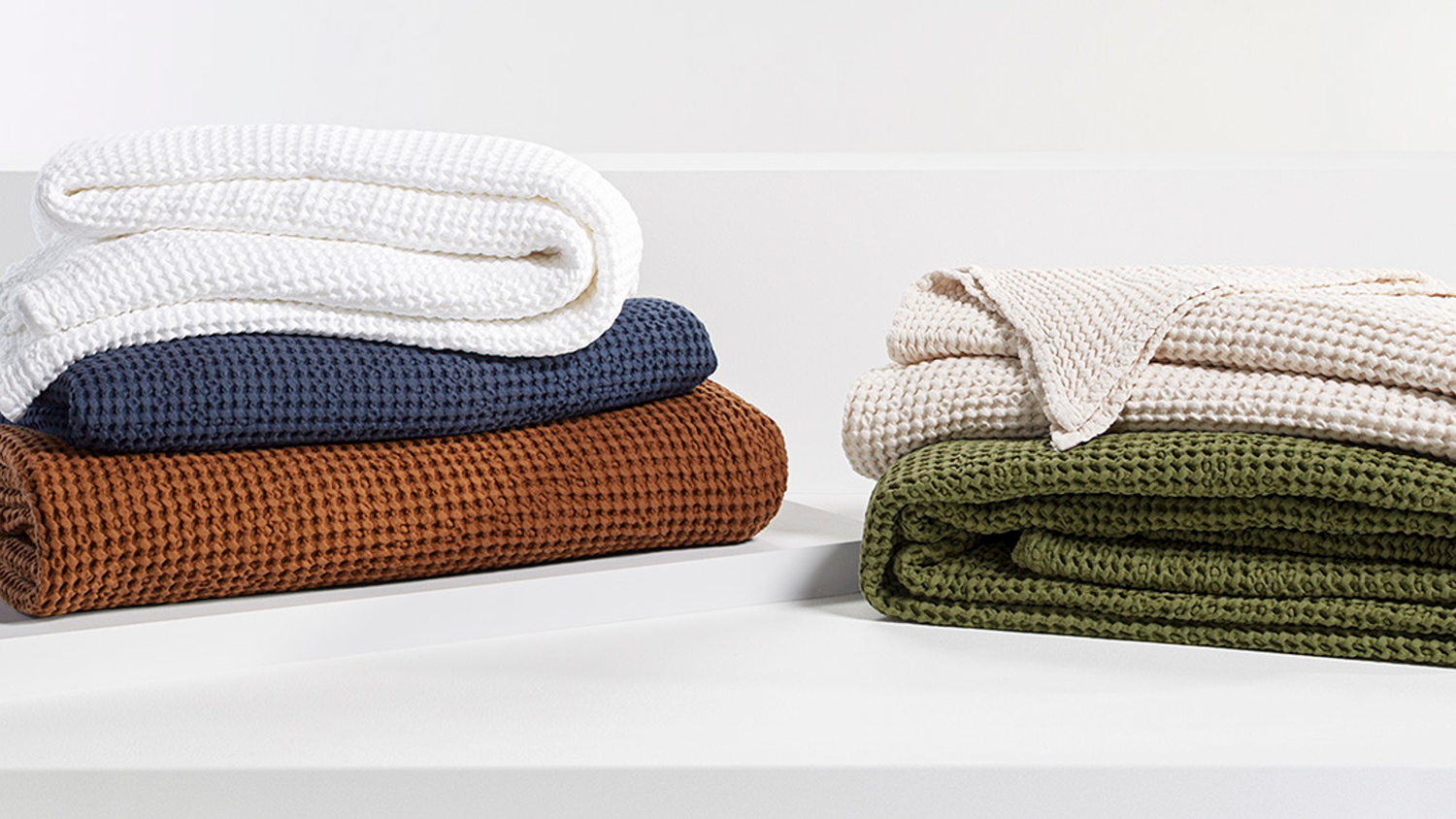 A side-by-side view of the New Bliss Small Stonewashed Waffle Blanket by Baksana