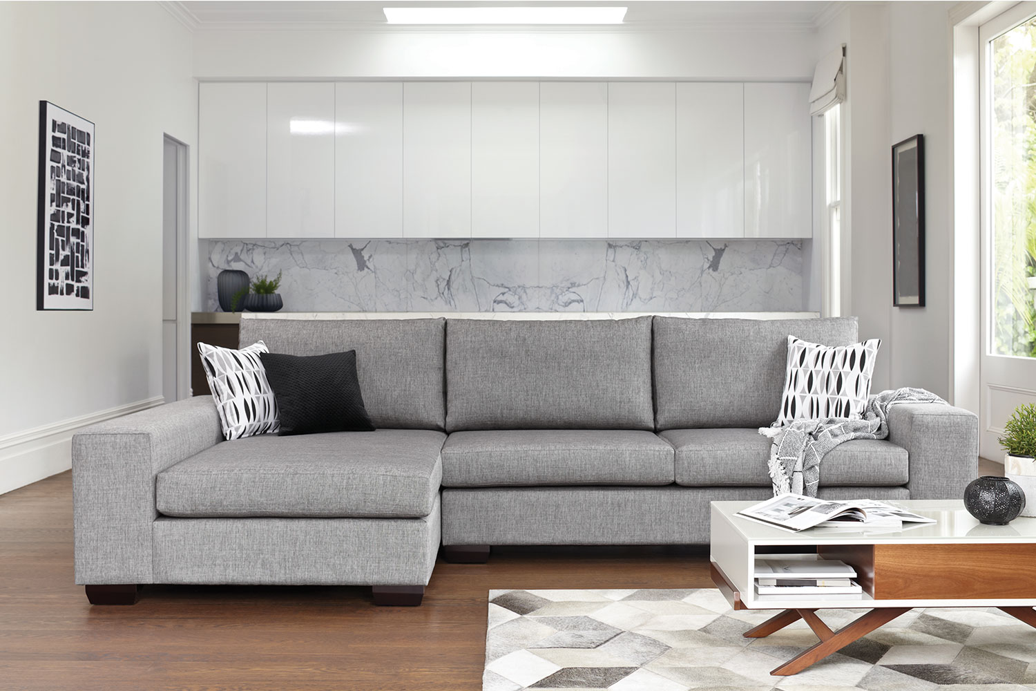 Kingdom 4 Seater Fabric Sofa with Chaise by Furniture Haven Harvey